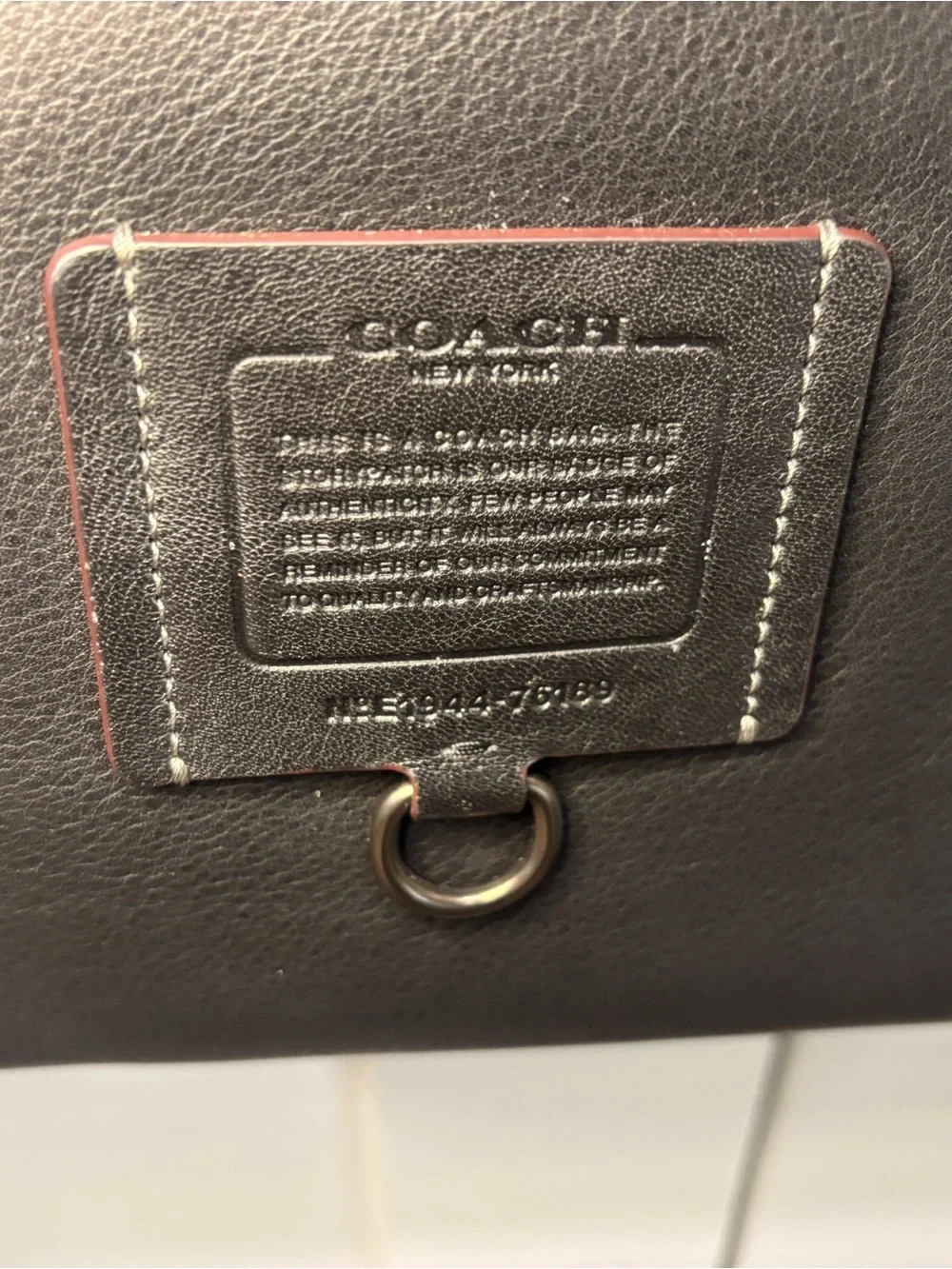 Coach dark brown Leather Messenger Pouch with Gold-Tone Zip